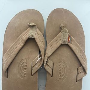 Never been worn tan Rainbow Sandals!